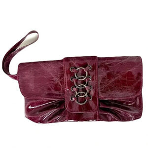 Giannini/ Clutch/ Burgundy faux leather and  metal ring detail